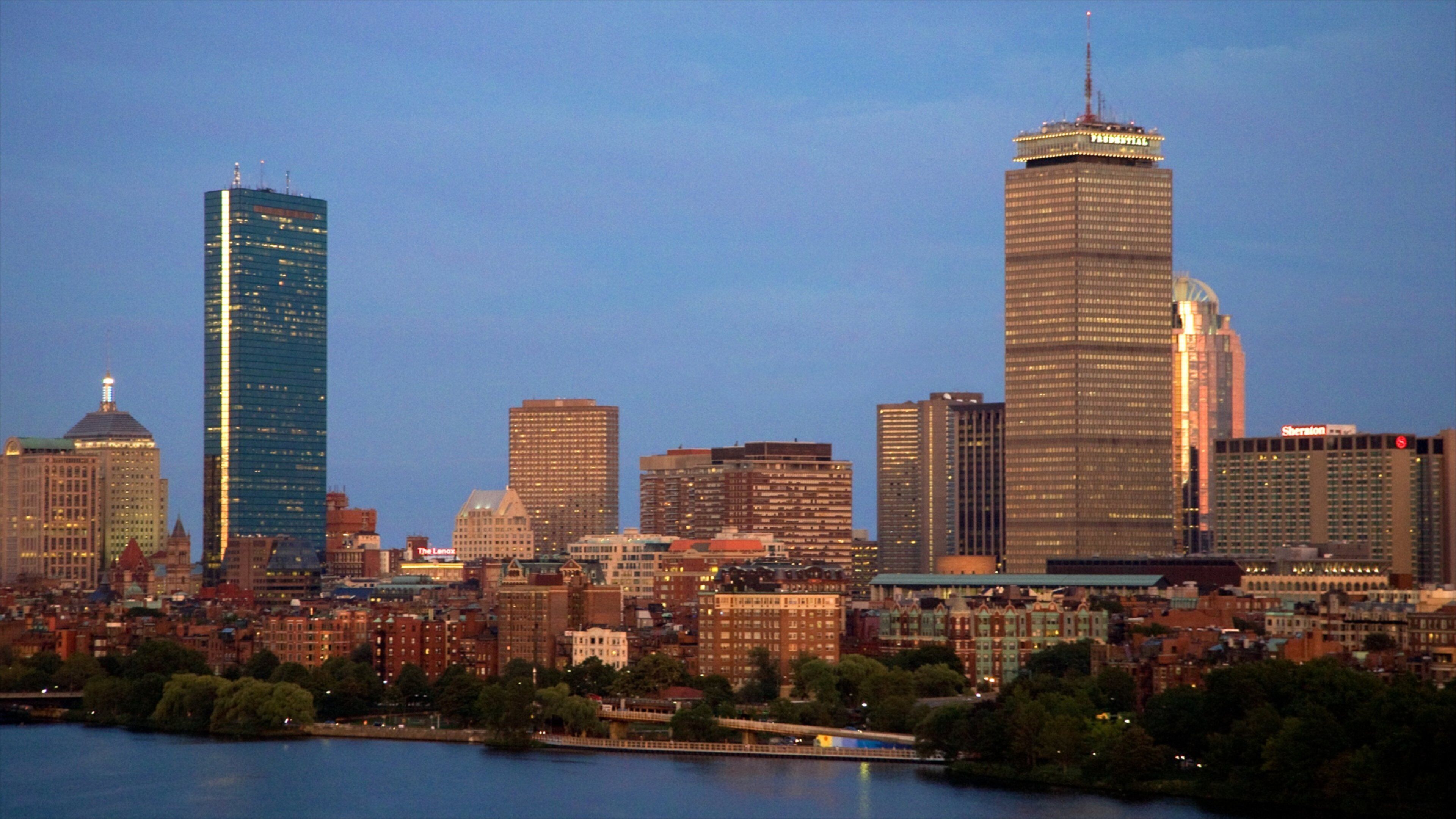 Prudential Tower stands tall against the twilight sky in Boston, showcasing the city's skyline and architectural beauty