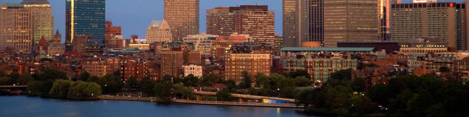 Prudential Tower stands tall against the twilight sky in Boston, showcasing the city's skyline and architectural beauty