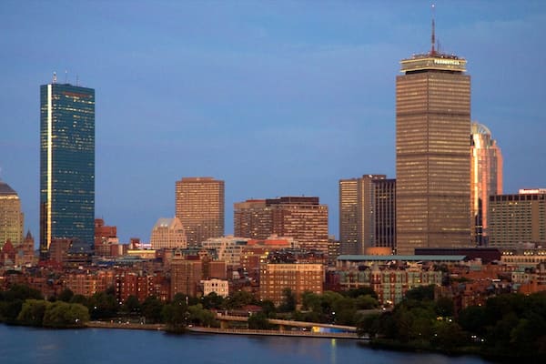 Prudential Tower stands tall against the twilight sky in Boston, showcasing the city's skyline and architectural beauty