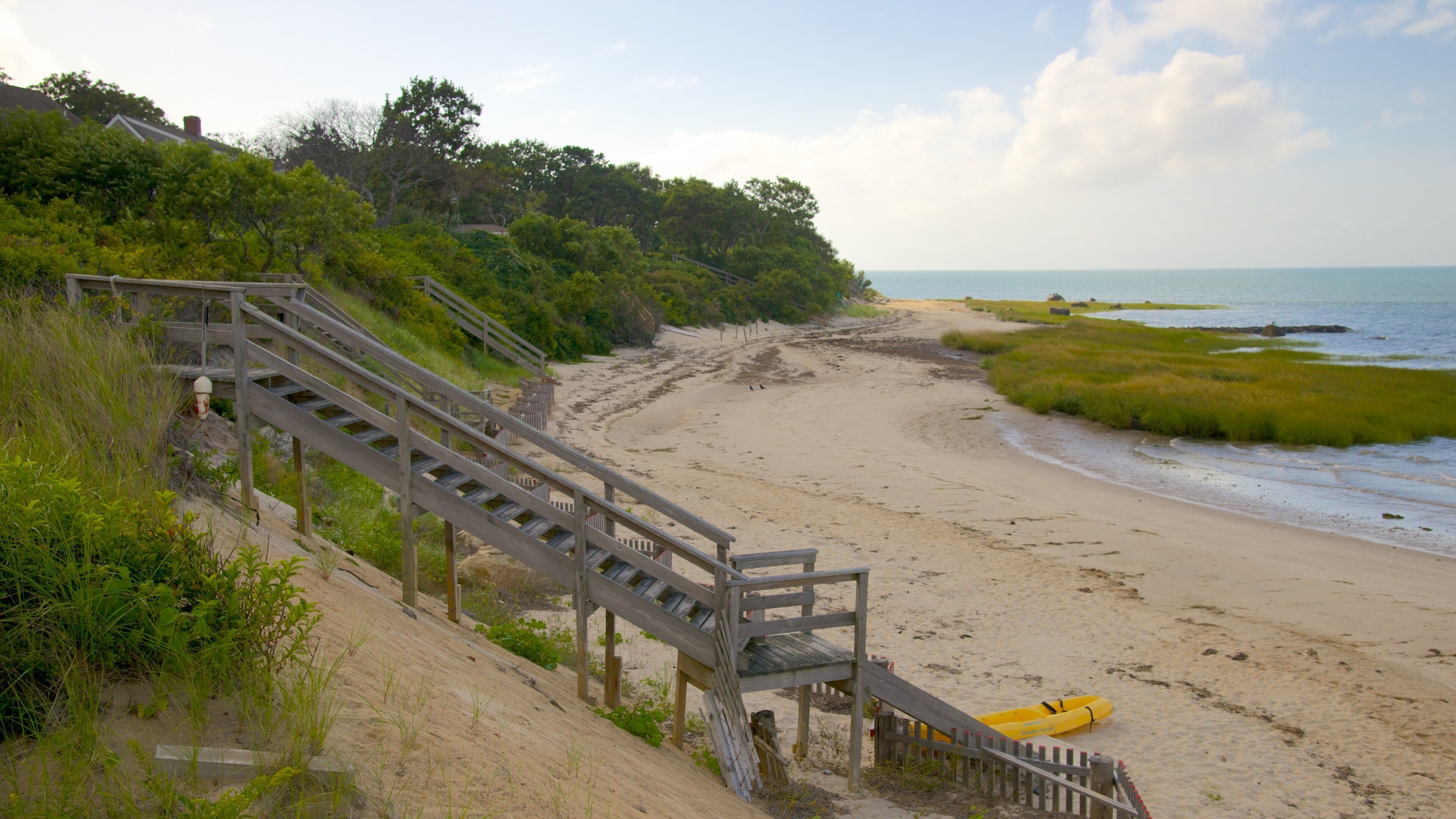 Breakwater Beach showing kayaking or canoeing and a beach