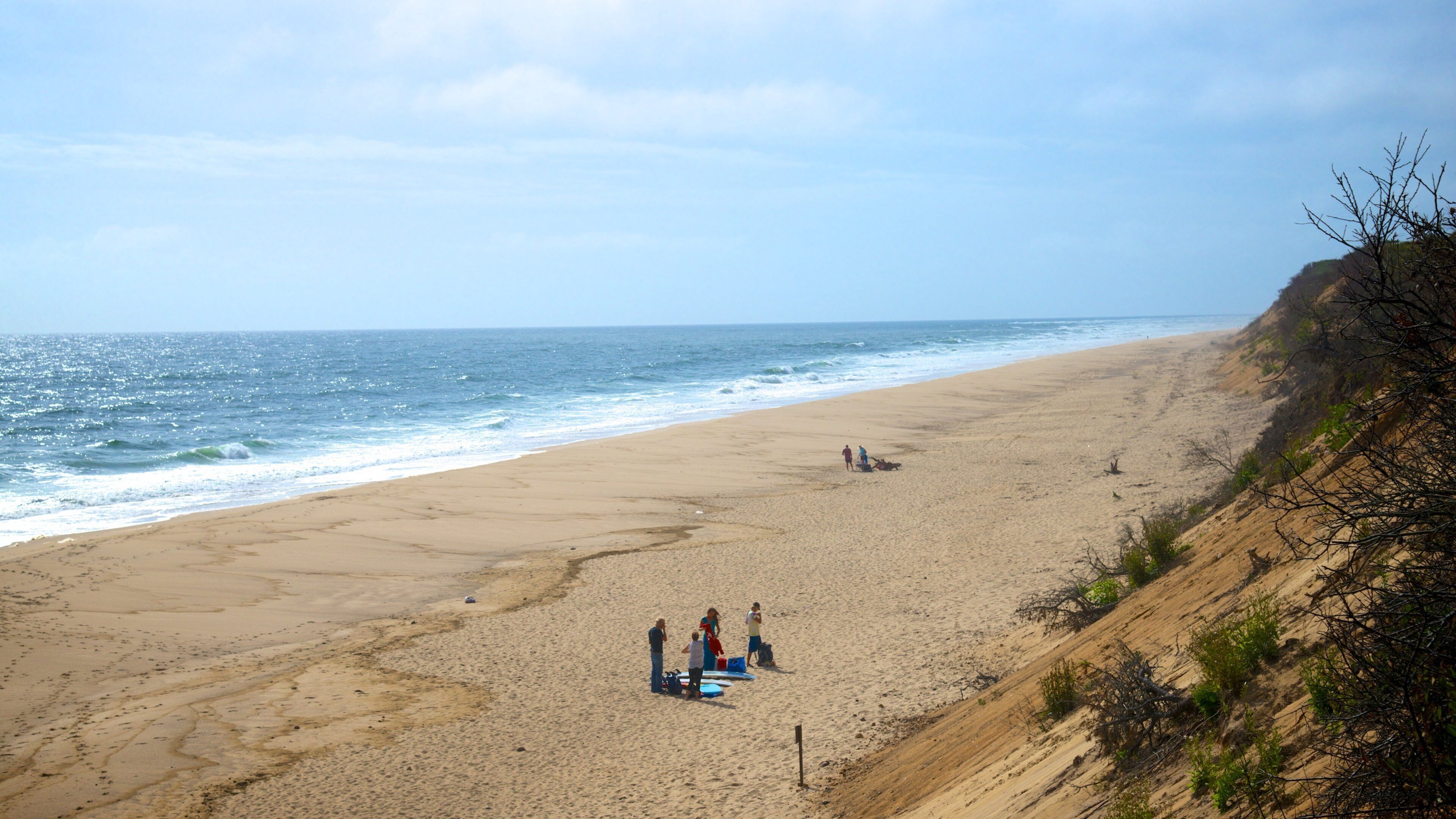 Nauset Light Beach which includes a beach and general coastal views as well as a small group of people