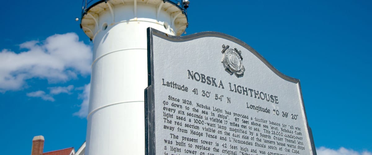 Nobska Lighthouse showing a lighthouse and signage