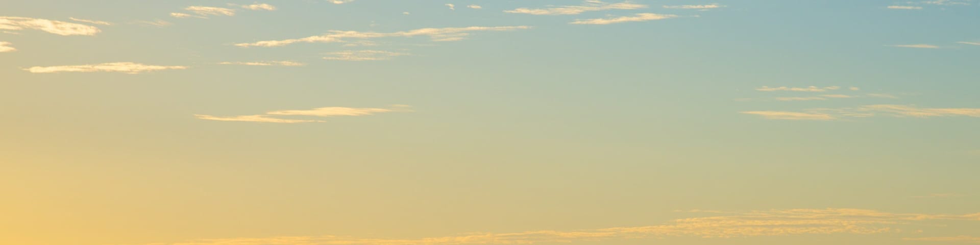 Sandy Neck Beach showing a pebble beach as well as a couple