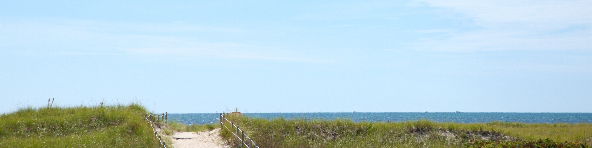 West Dennis Beach which includes a beach and general coastal views