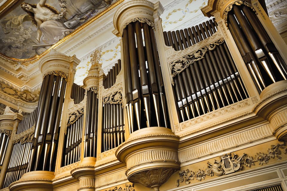 Ornate architectural details, including columns and decorative moldings.