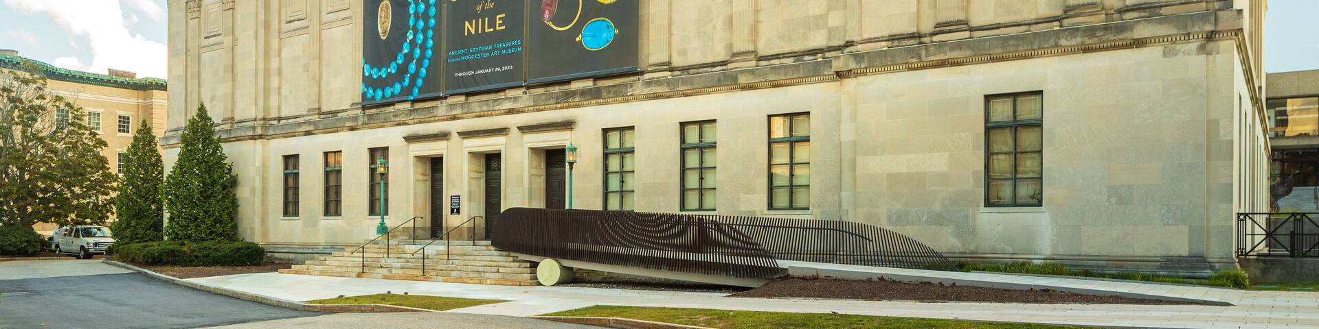 A museum building with a large display of ancient Egyptian jewelry.