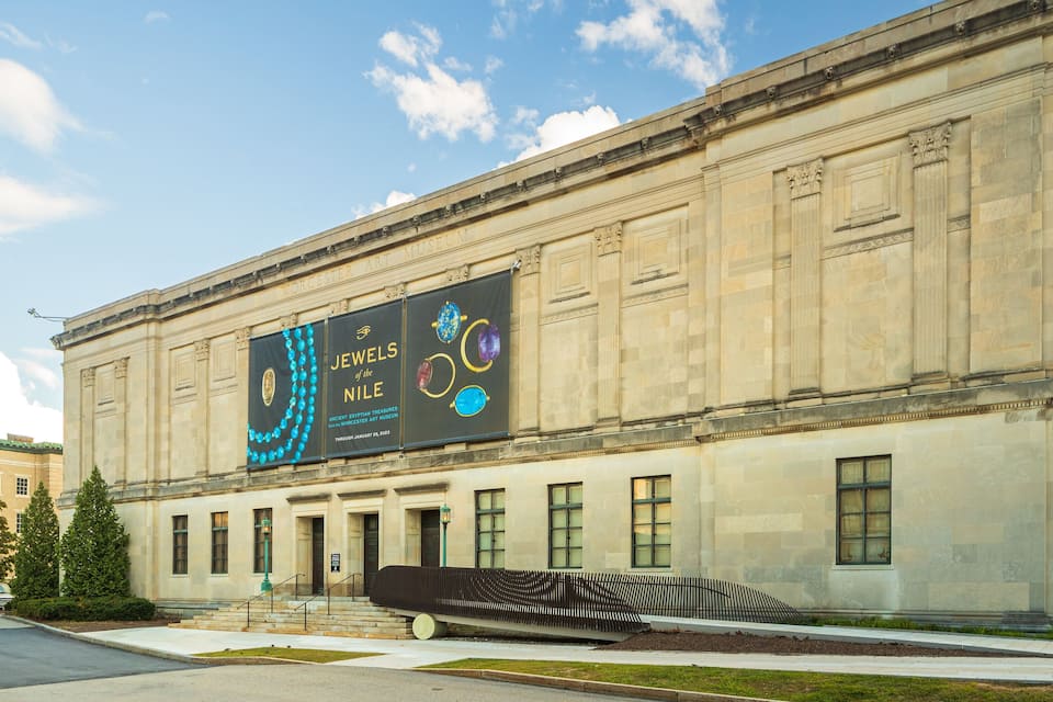 A museum building with a large display of ancient Egyptian jewelry.