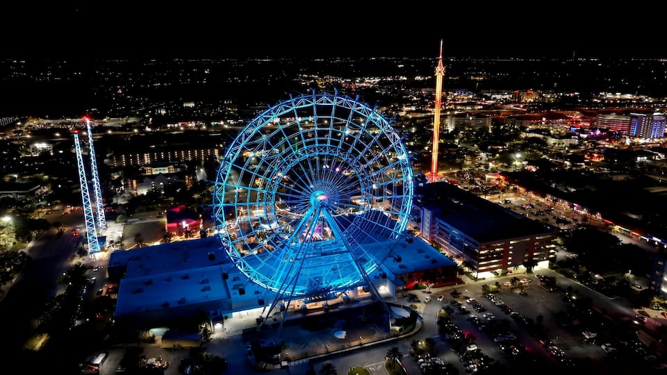Ferris Wheel In Orlando Florida United States. Aerial View Of Exciting Amusement Park Perfect For Family Fun. Building Metropole Skyline Buildings Beautiful. Buildings Flyover Night. Orlando Florida.