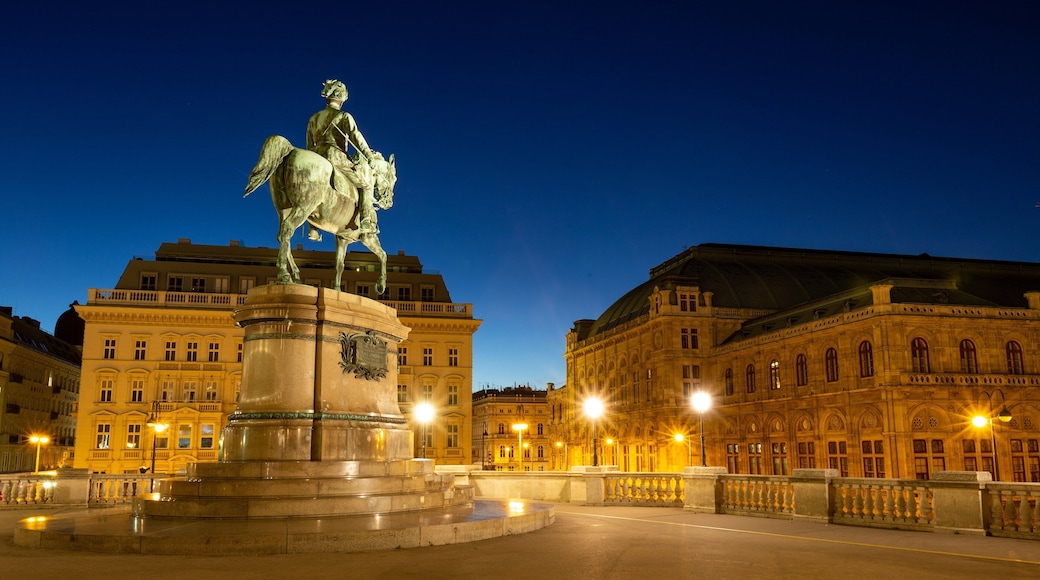 Albertina featuring night scenes, heritage architecture and a city