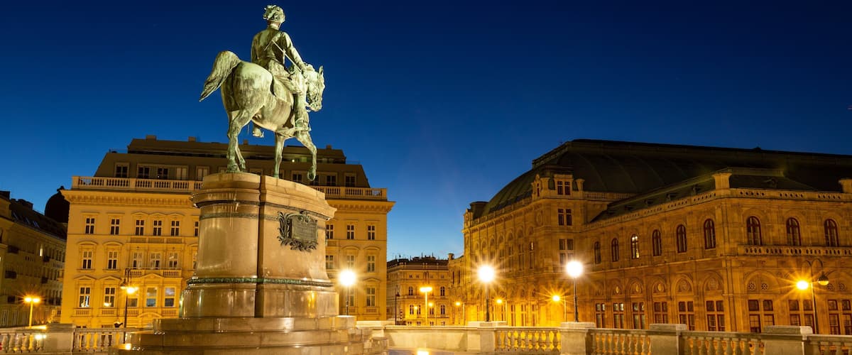 Albertina featuring night scenes, heritage architecture and a city