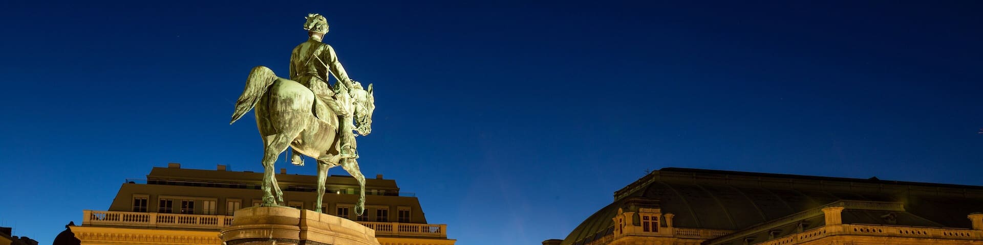 Albertina featuring night scenes, heritage architecture and a city