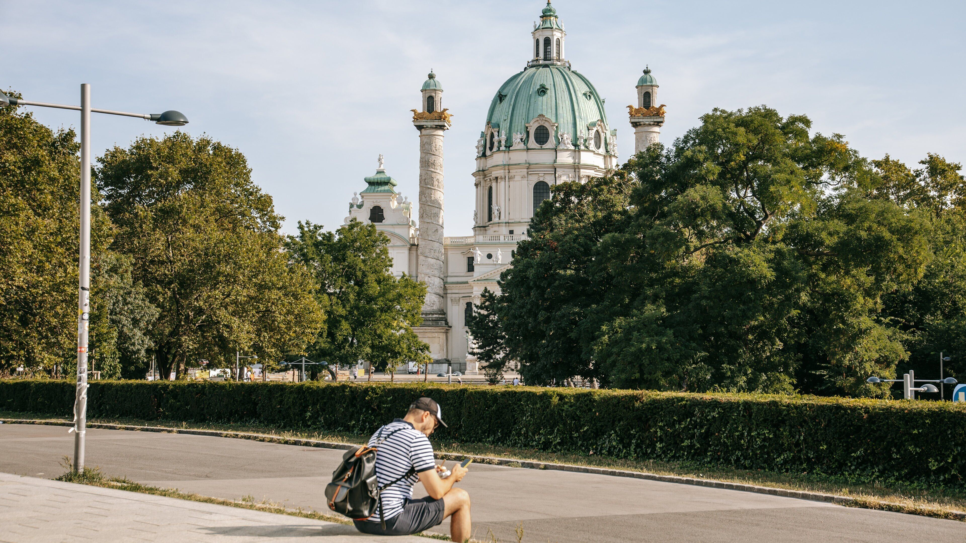 Karlsplatz which includes heritage architecture as well as an individual male