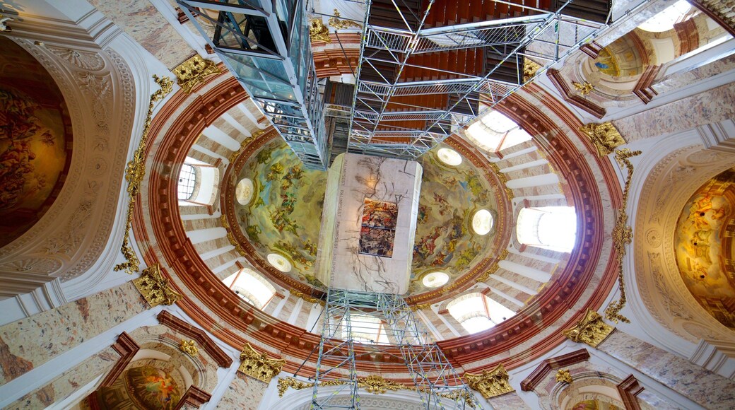 Iglesia de San Carlos que incluye vistas interiores, aspectos religiosos y una iglesia o catedral