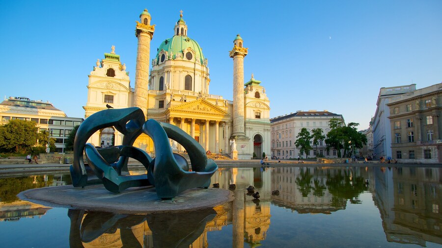 St. Charle\'s Church showing heritage architecture, a pond and religious elements