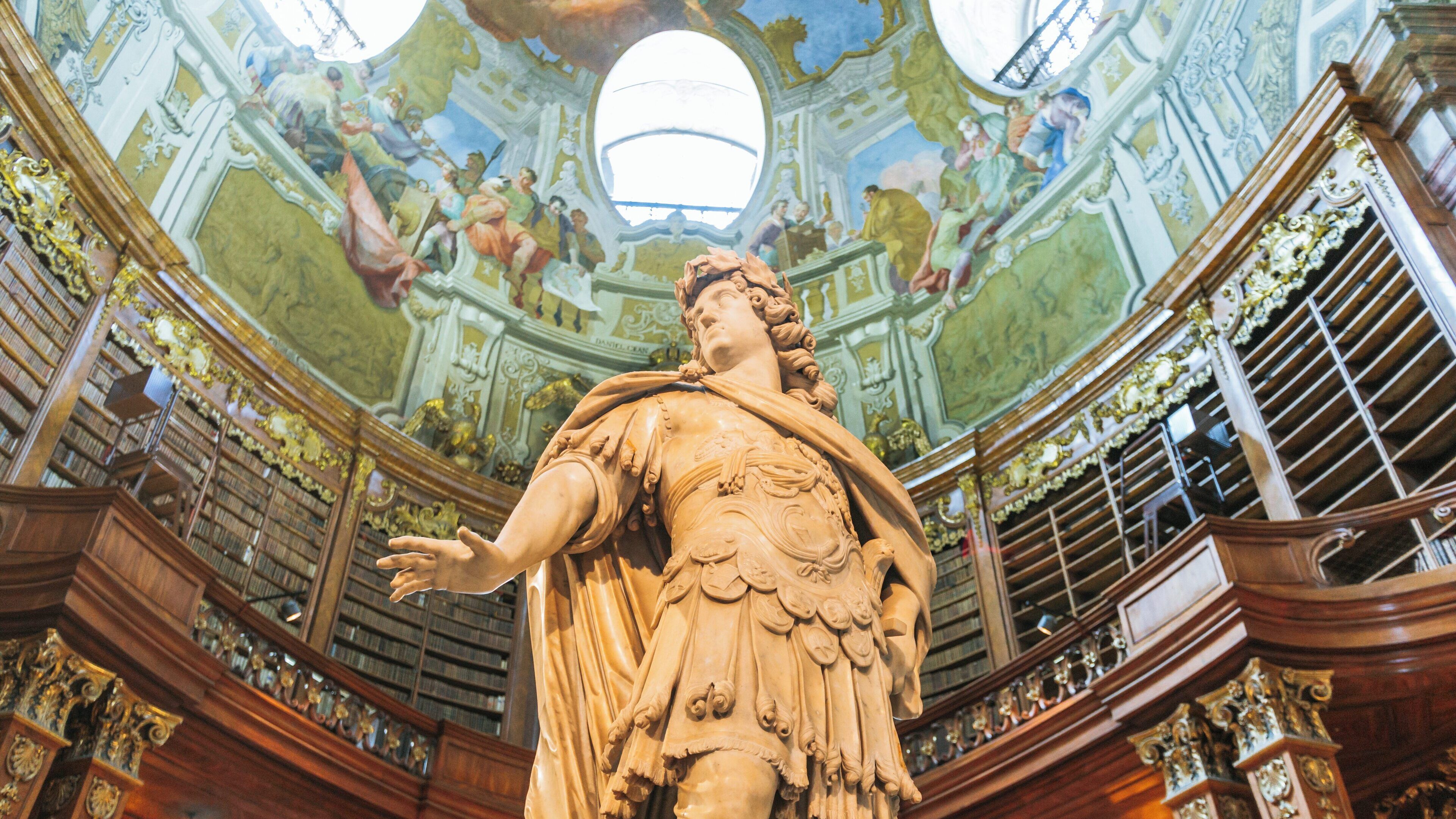 Visiting the stunning Austrian National Library in Innere Stadt, Vienna showcases majestic architecture and historical sculptures reflecting cultural heritage