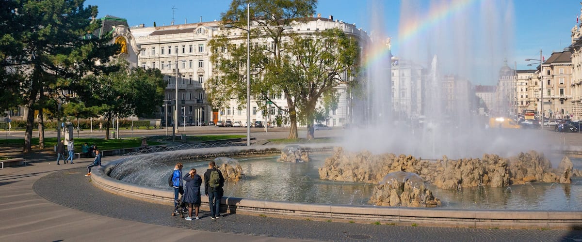 Soviet War Memorial which includes a fountain as well as a small group of people