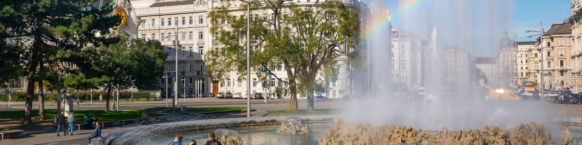 Soviet War Memorial which includes a fountain as well as a small group of people