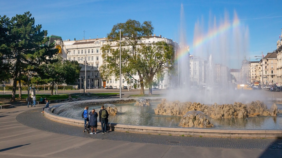 Soviet War Memorial which includes a fountain as well as a small group of people