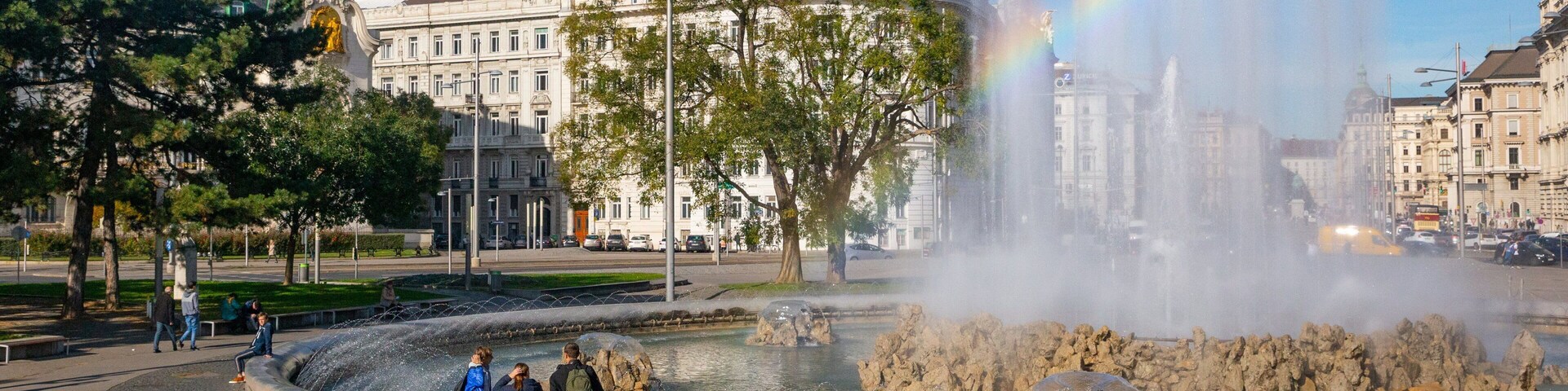 Soviet War Memorial which includes a fountain as well as a small group of people