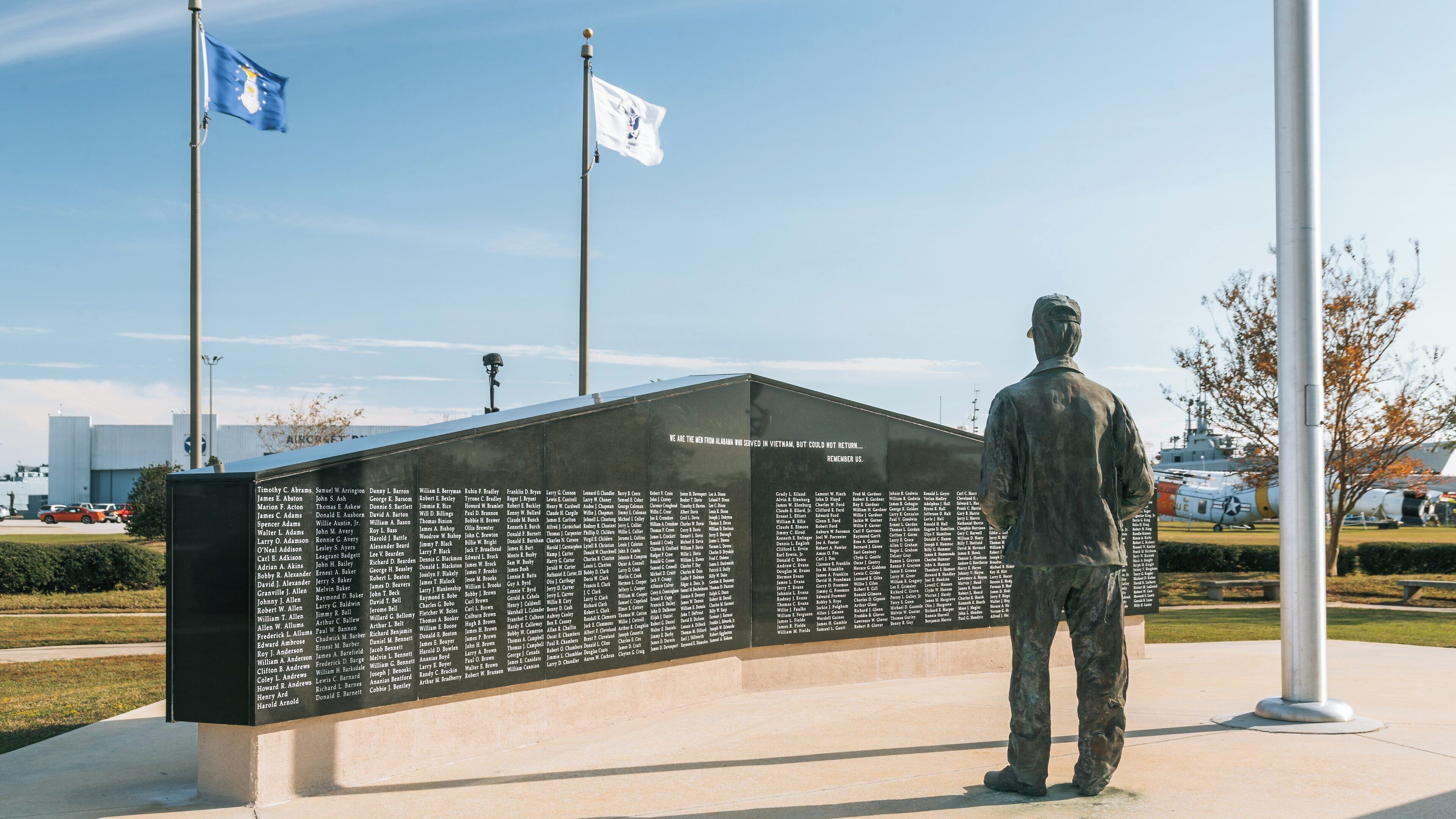 USS Alabama Battleship Memorial Park showcases a tribute to veterans in Mobile Alabama with a striking memorial and flags
