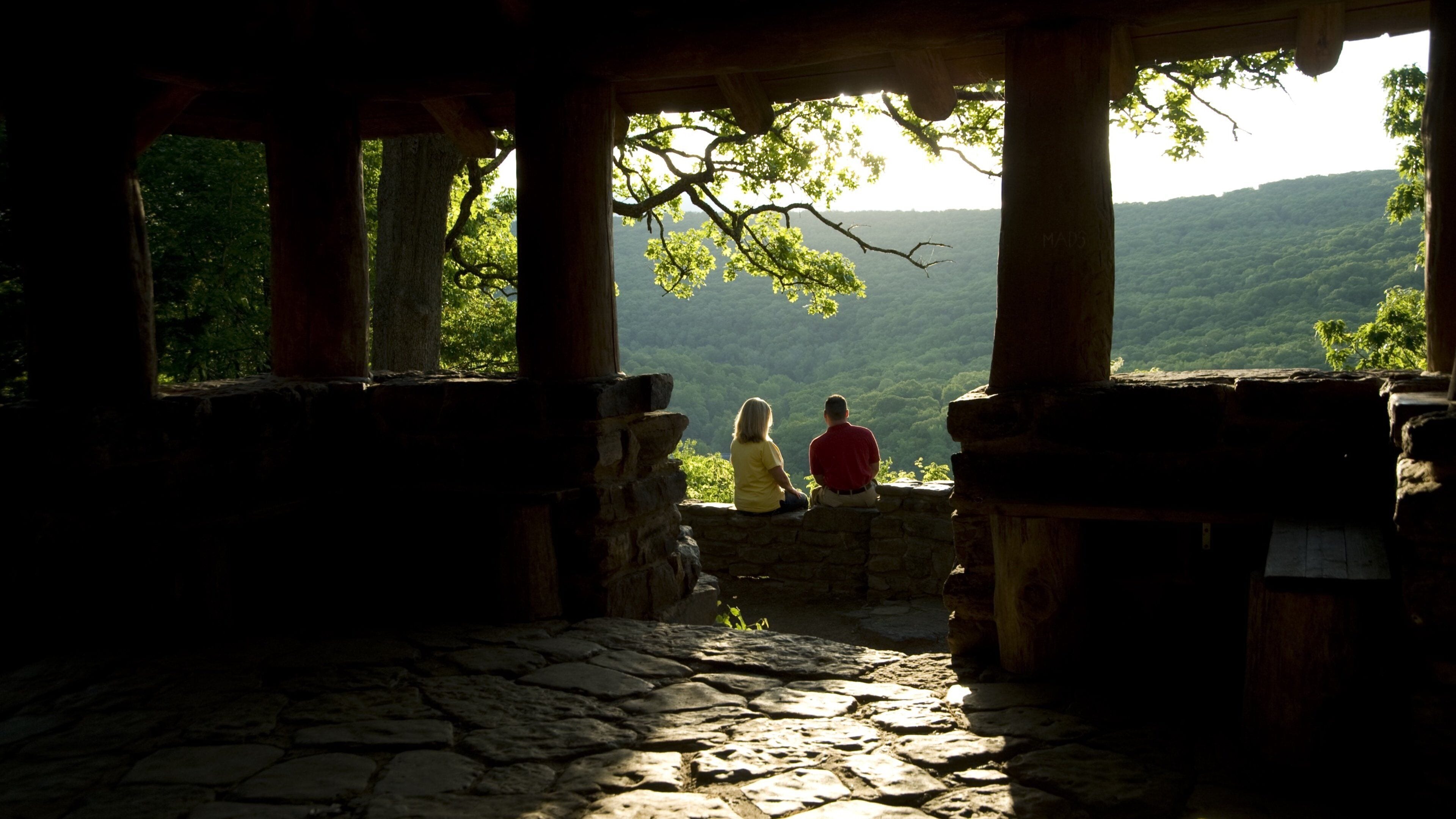 Devil\'s Den State Park showing tranquil scenes and a sunset as well as a couple
