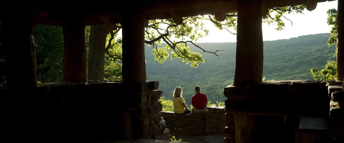 Devil\'s Den State Park showing tranquil scenes and a sunset as well as a couple