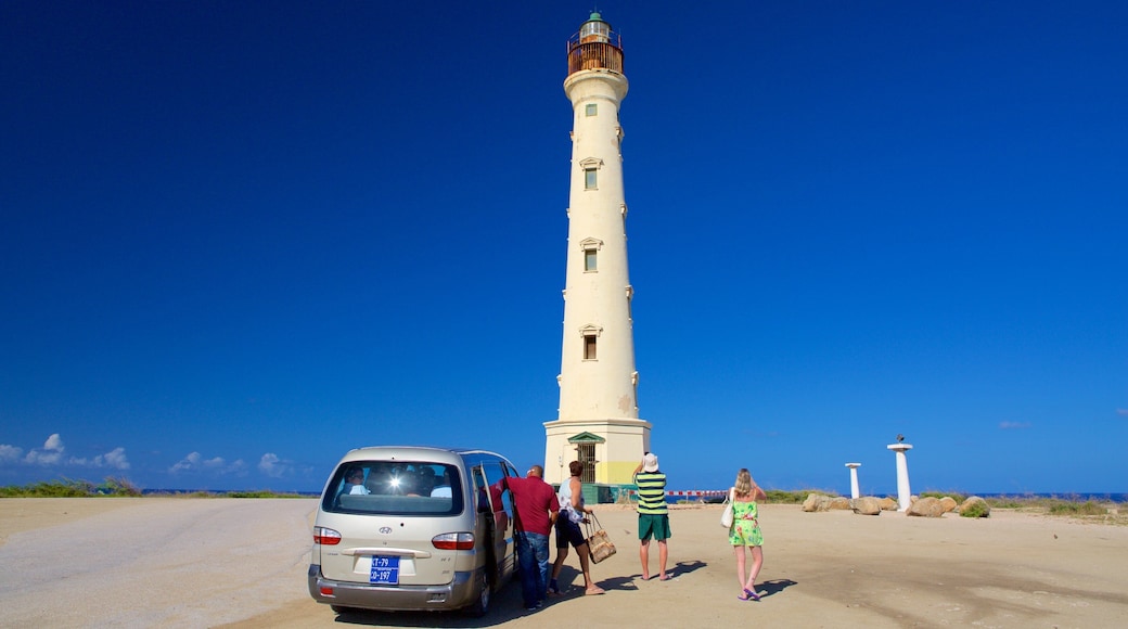 California Lighthouse showing a lighthouse as well as a small group of people