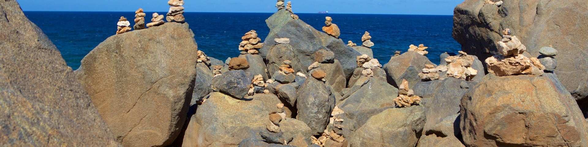 Natural Bridge - Boca Andicuri featuring general coastal views