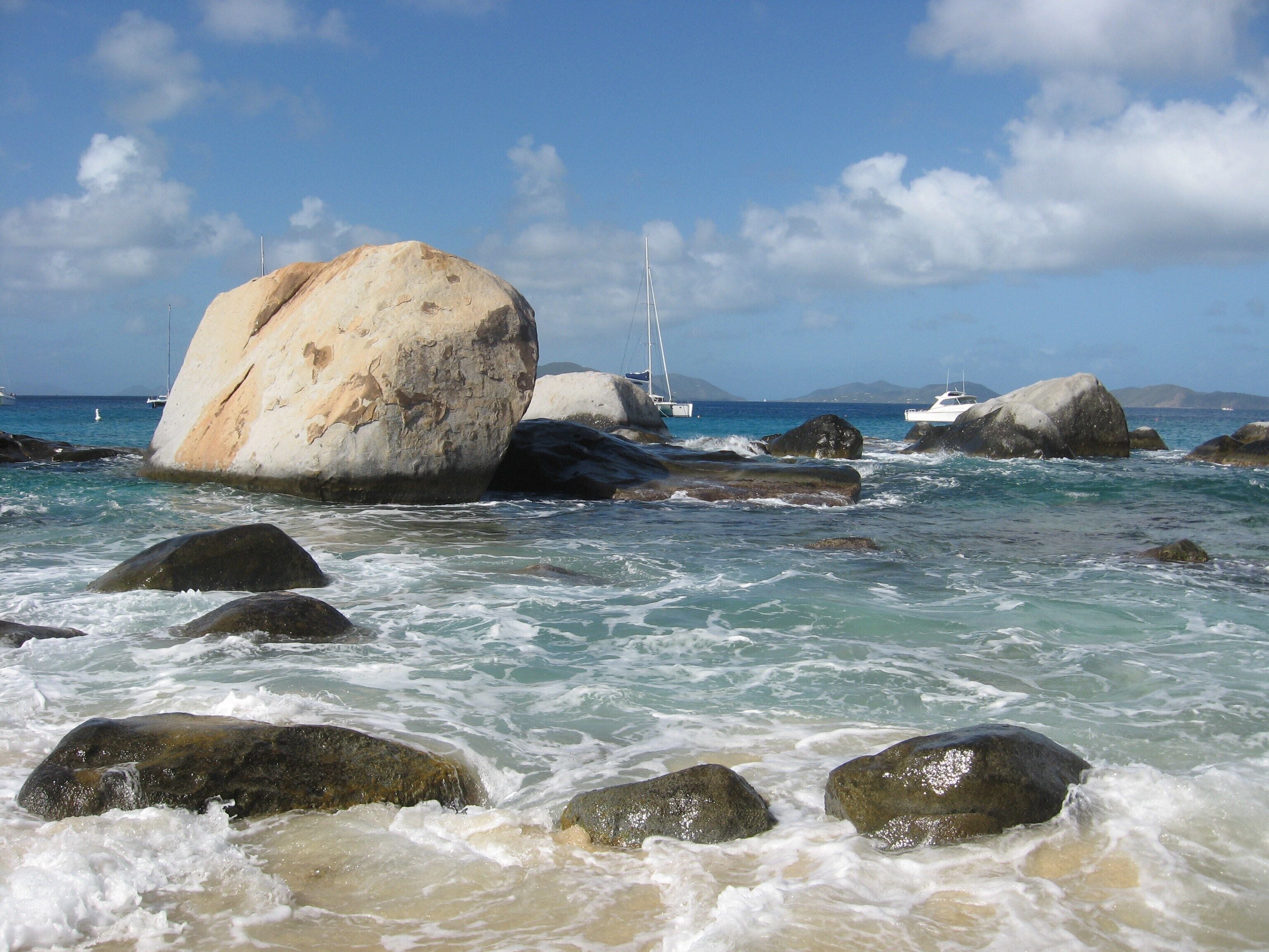 Many people don't know that "The Baths" are on the island of Virgin Gorda. Hidden away, if you drive by you'd think it was just a view of the ocean from a cliff. Park and walk down the cliff and you have a spectacular sight of huge boulders that sit in the water with breathtaking scenery. You can walk on some of the boulders, swim around them in places and the water is pristine and blue. #BeachTips