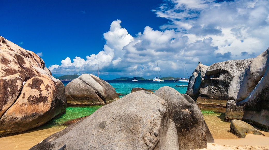 Looking our at sailboats over boulders at The Baths, Virgin Gorda, British Virgin Islands.