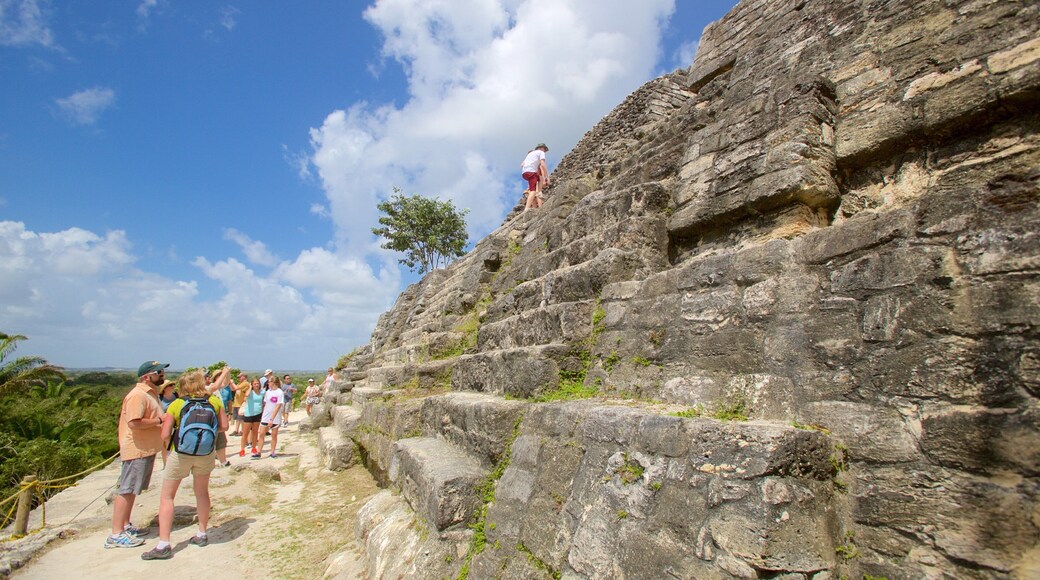 Lamanai featuring indigenous culture and heritage elements as well as a small group of people