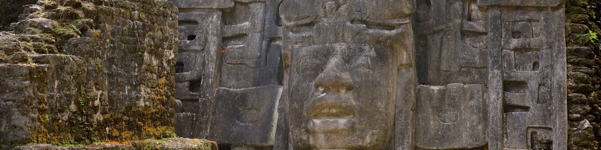 Lamanai Mayan Ruins which includes a statue or sculpture and heritage elements