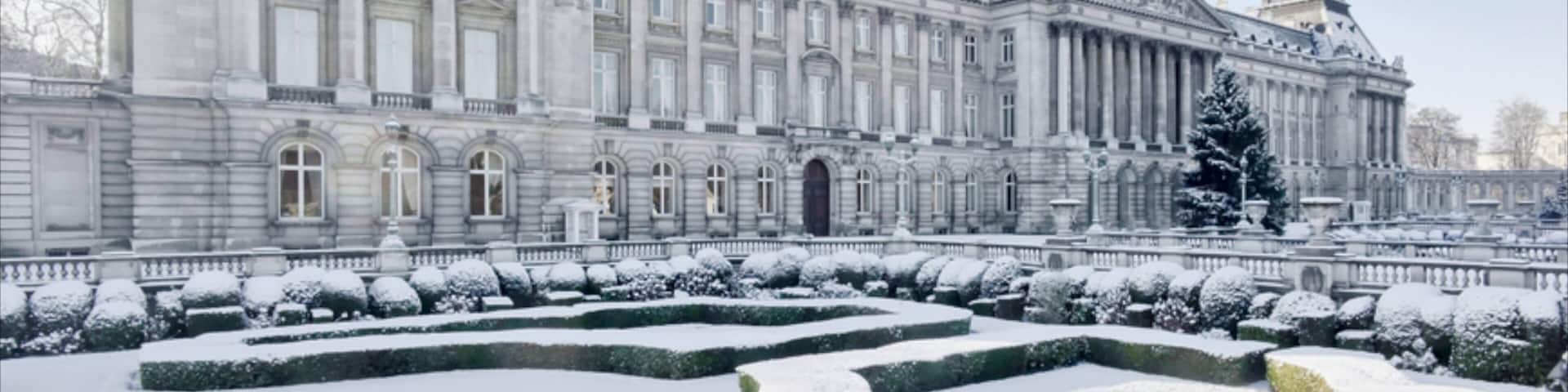 Royal Palace of Brussels which includes snow, a castle and heritage architecture