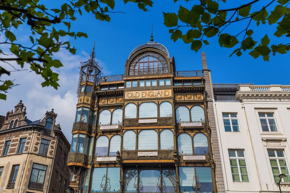 A historic building with ornate architecture and the sign "Old England" prominently displayed.