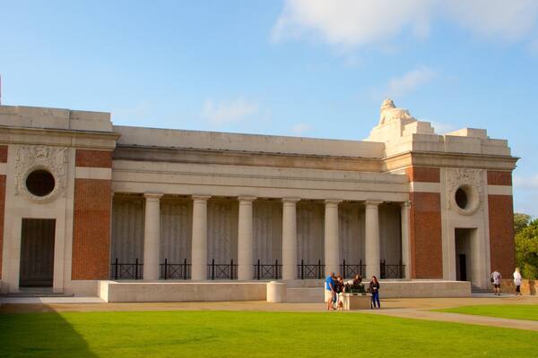 Menin Gate Memorial which includes heritage elements and a park as well as a small group of people