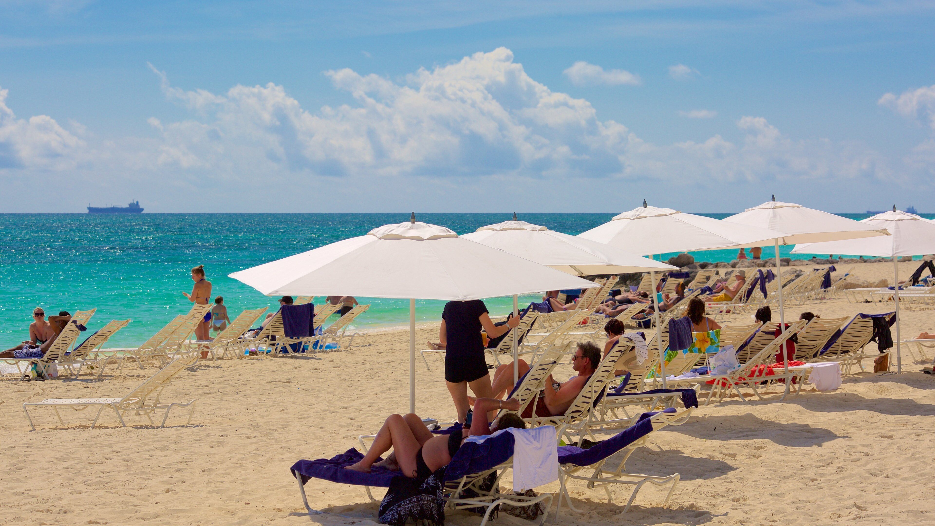 Lucaya Beach which includes general coastal views, a luxury hotel or resort and a beach