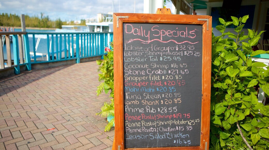Port Lucaya Marketplace showing signage and café scenes