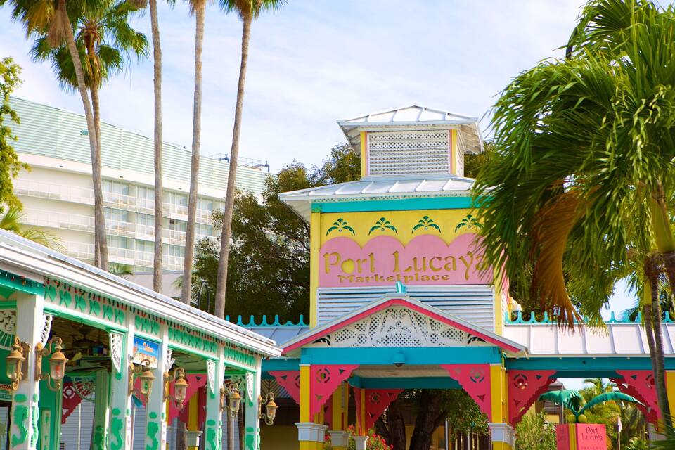 A colorful building with a sign reading "Port Lucaya Marketplace".