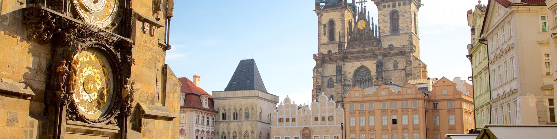 Astronomical Clock featuring a square or plaza and a city