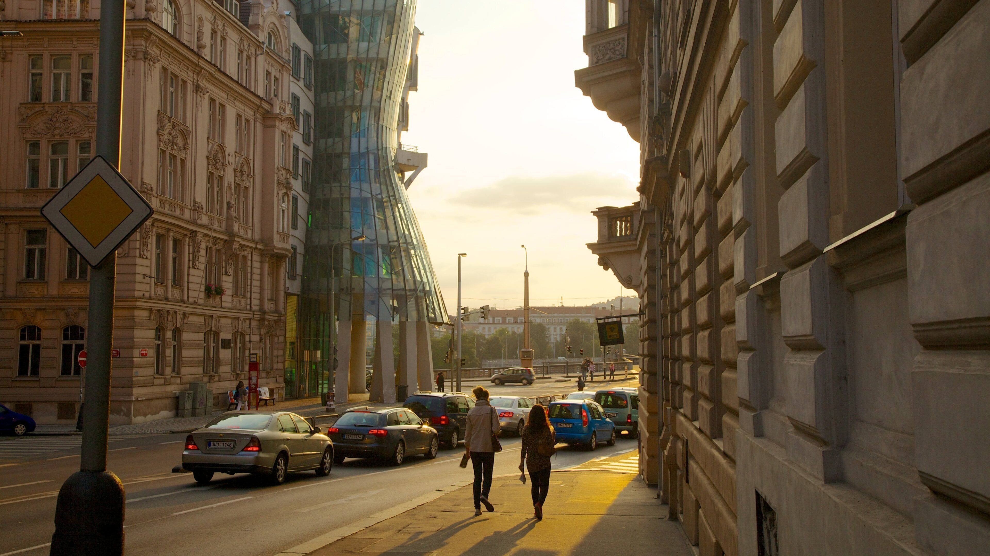 Prague Dancing House featuring street scenes, modern architecture and a city