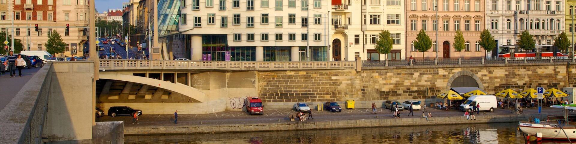 Prague Dancing House which includes modern architecture, heritage architecture and a bridge