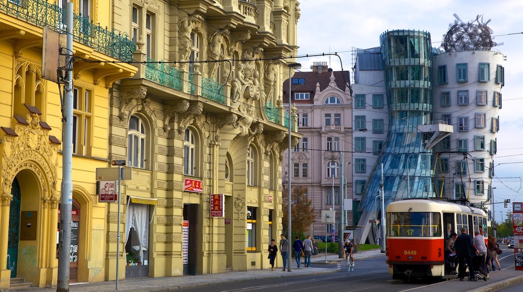 Prague Dancing House featuring modern architecture, street scenes and a city