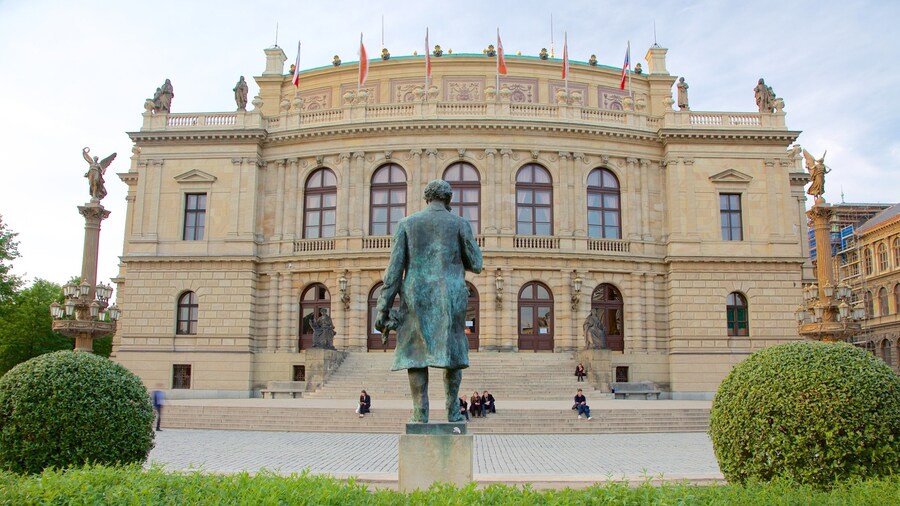 Rudolfinum showing a statue or sculpture, a city and heritage elements