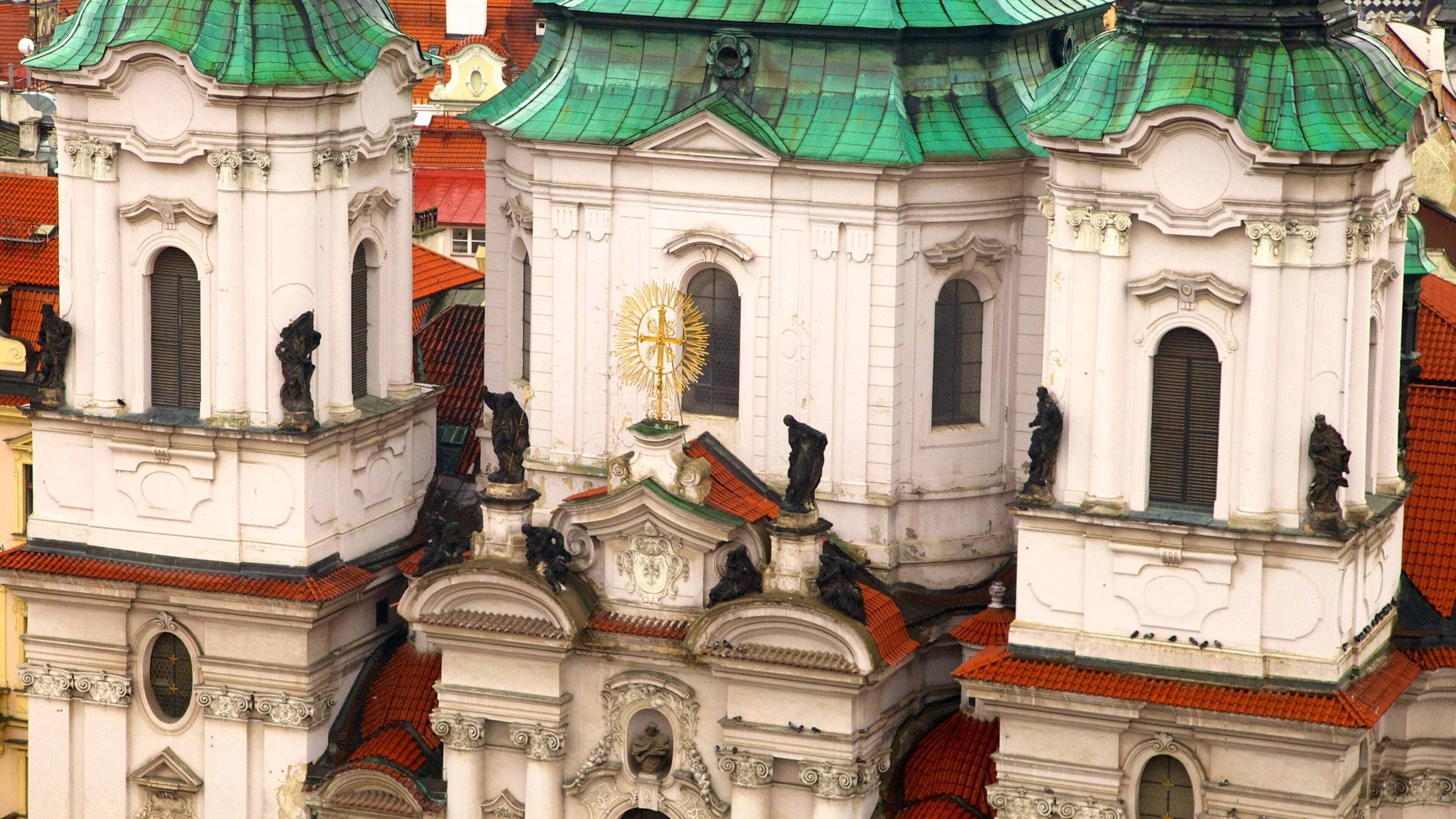 St. Nicholas Church at the Old Town Square which includes a church or cathedral and religious elements