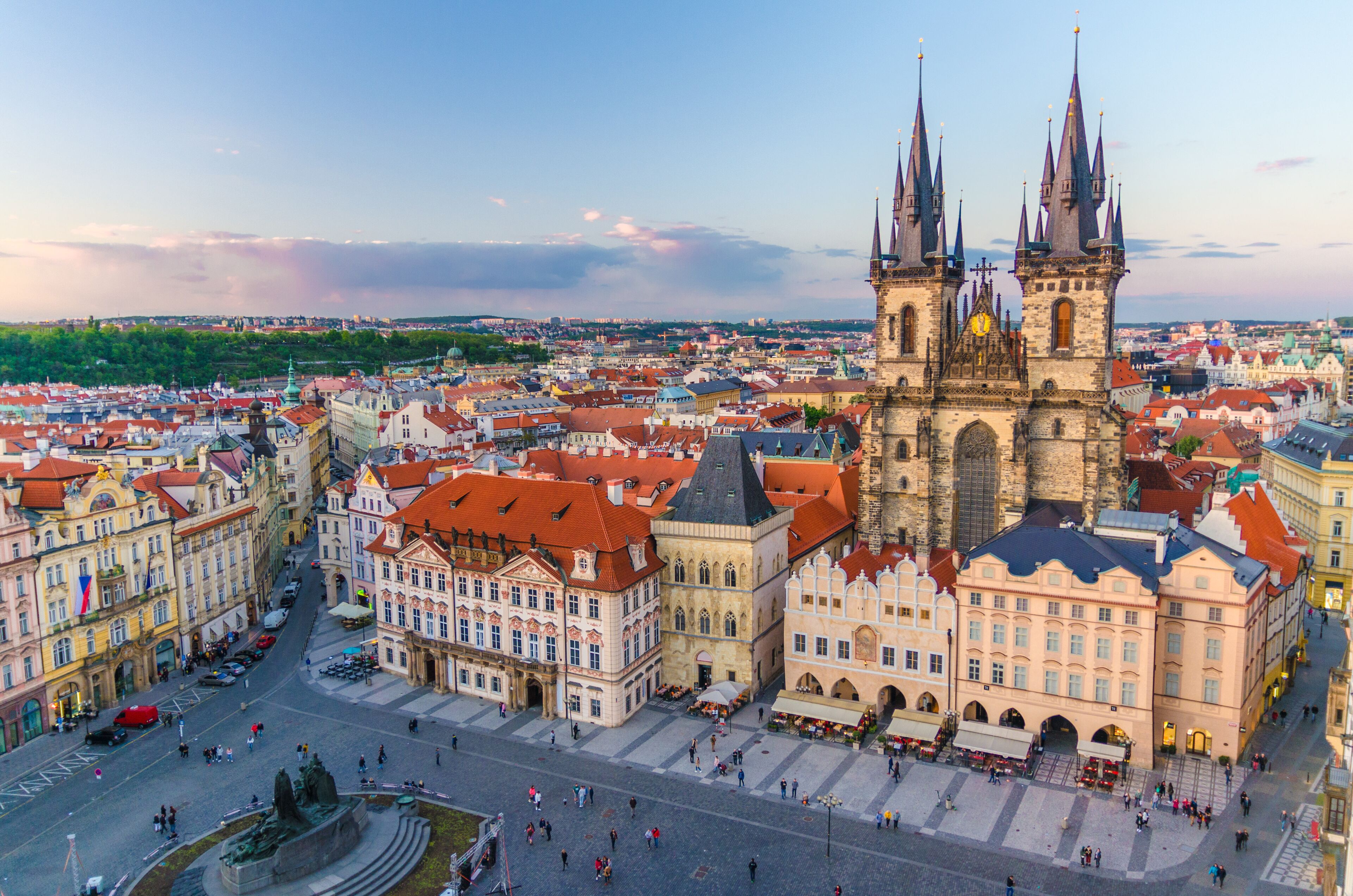 Top aerial view of Prague Old Town Square (Stare Mesto) historical city centre. Former market square. Stone Bell House, Gothic Church of Our Lady before Tyn, evening view. Bohemia, Czech Republic