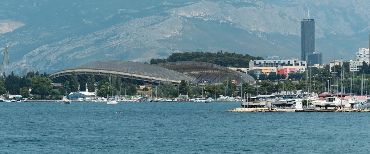 Poljud stadium and cityscape of Split in Croatia surrounded by the tranquil sea