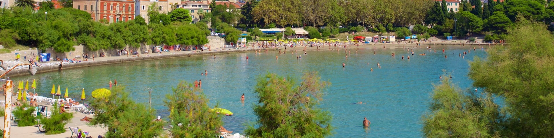 Bacvice Beach which includes general coastal views and a city