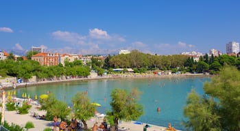 Bacvice Beach which includes general coastal views and a city