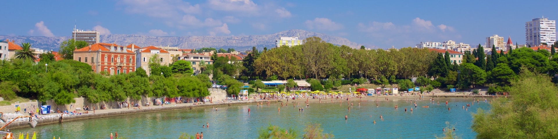 Bacvice Beach which includes general coastal views and a city
