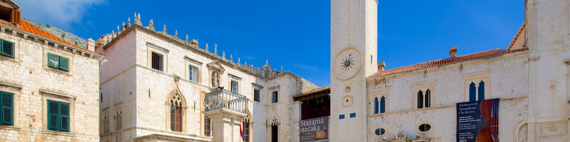 Sponza Palace which includes heritage architecture and a square or plaza as well as a small group of people